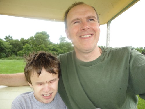Paul and Dad on the golfcart